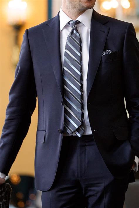 dark blue suit with tie